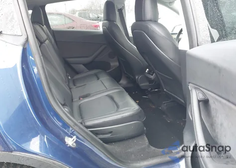 2023 Tesla Model Y Awd/Long Range Dual Motor All-Wheel Drive z USA, uszkodzony, nr VIN 7SAYGAEE3PF666552